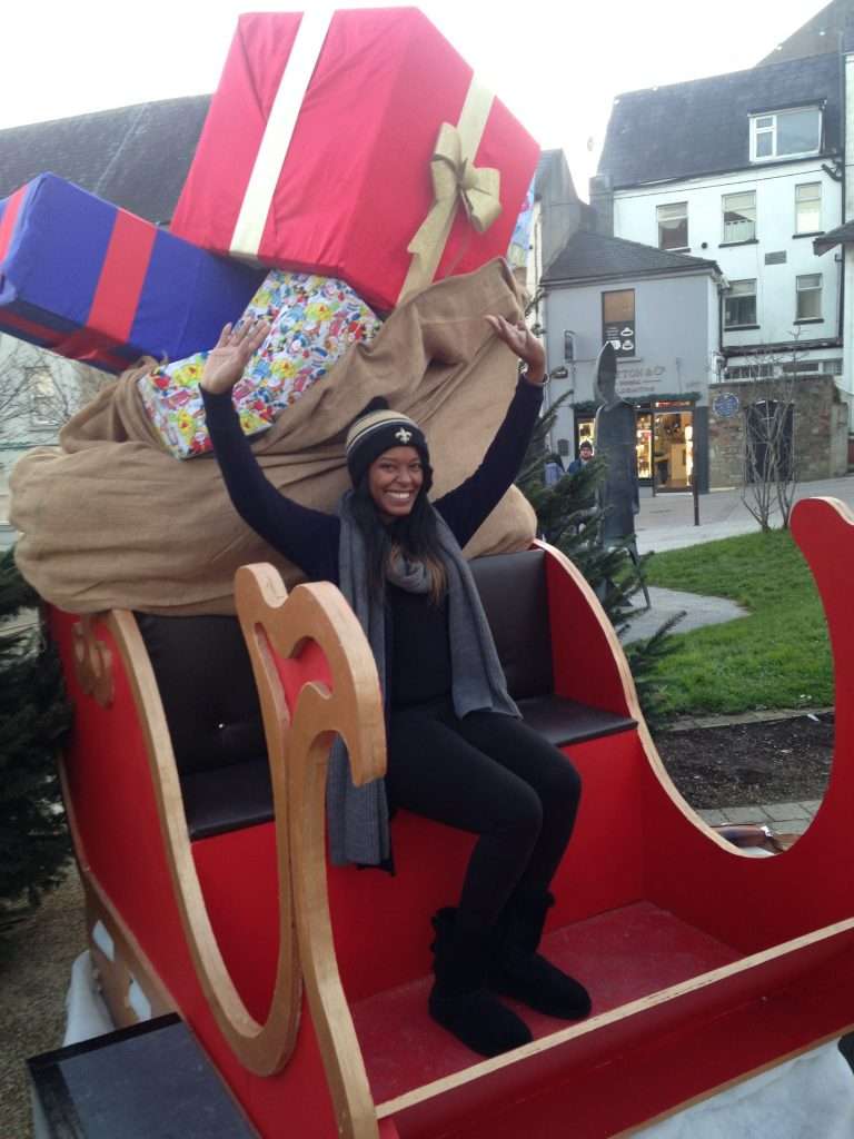 Sitting in big red sleigh in Waterford Ireland