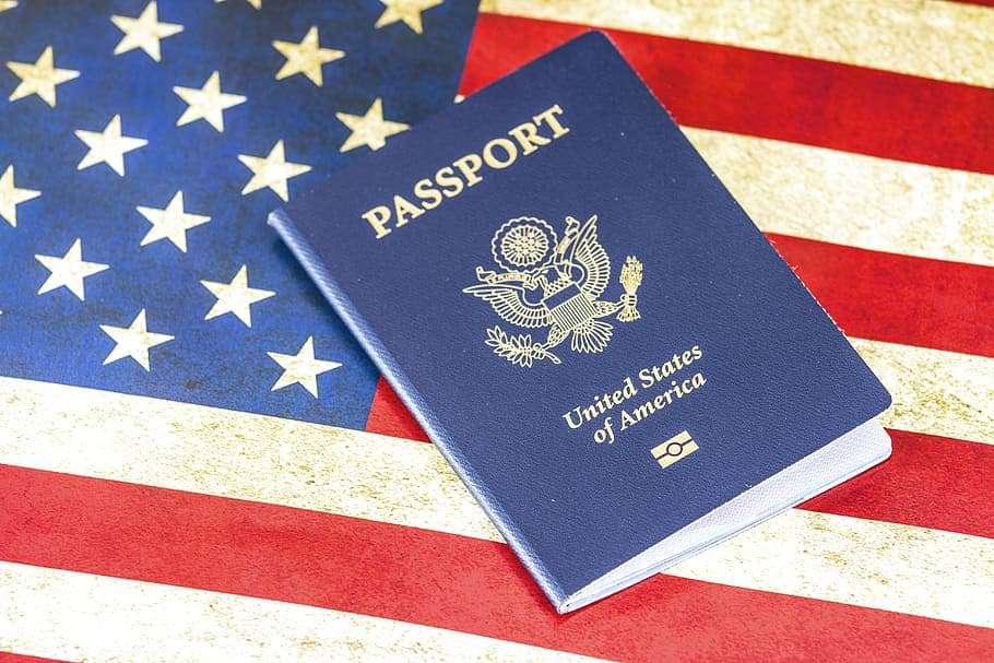 USA passport on American flag