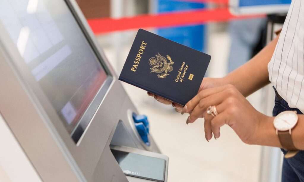 Woman at airport kiosk