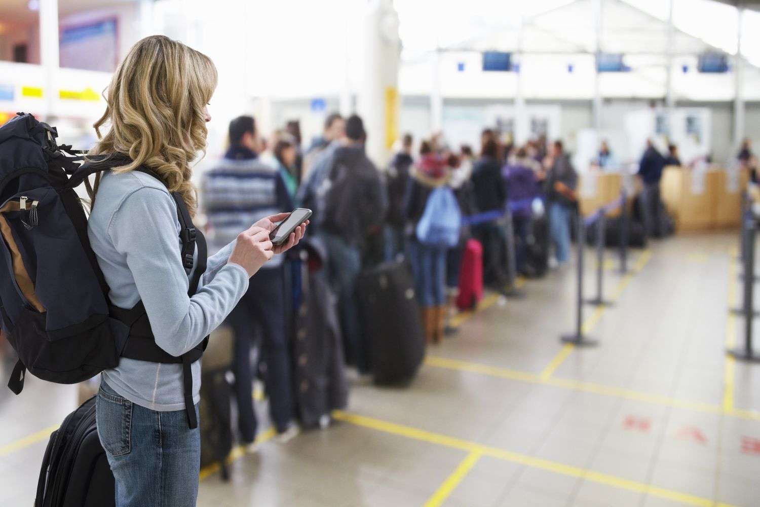 woman at airport on phone 2