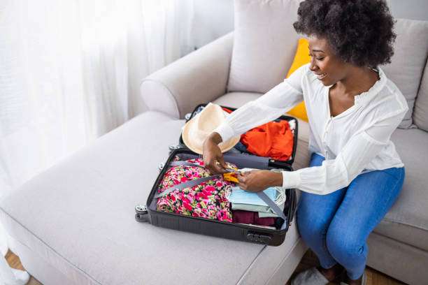 Girl packing suitcase