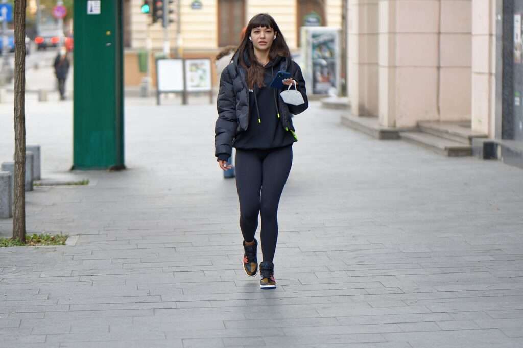 Woman wearing layers on street